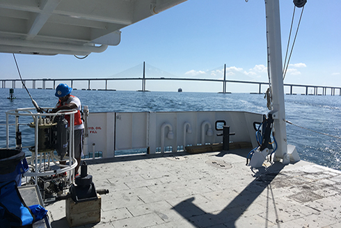 Student Tione Grant tends the CTD aboard a research cruise as part of the NSF-funded Research Experiences for Undergraduates (REU) at the USF College of Marine Science in 2019.