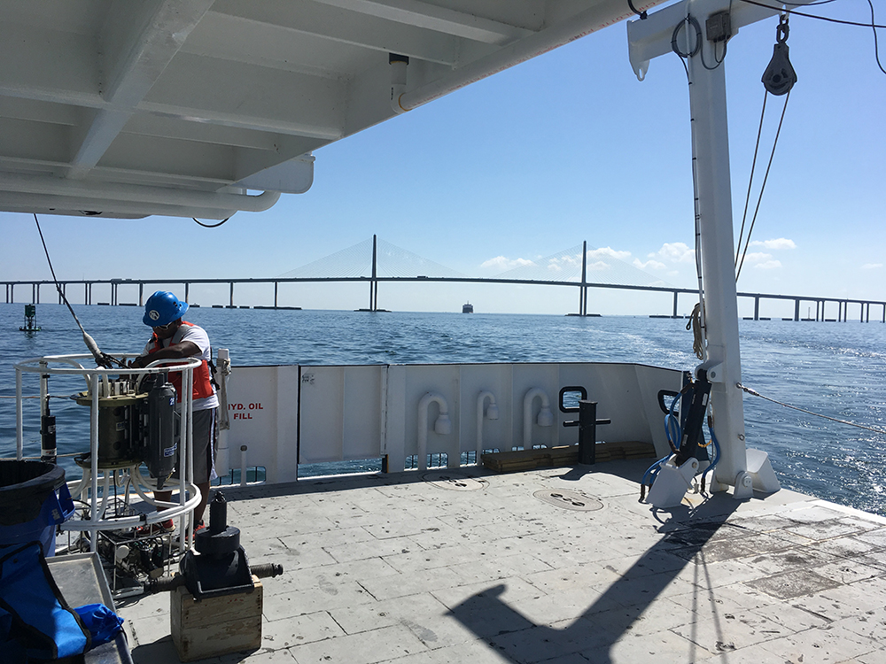 Student Tione Grant tends the CTD aboard a research cruise as part of the NSF-funded Research Experiences for Undergraduates (REU) at the USF College of Marine Science in 2019.