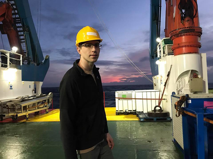 Sunset on the fantail of the RSS James Cook in the mid-Atlantic Ocean during a GEOTRACES cruise (GA13). 