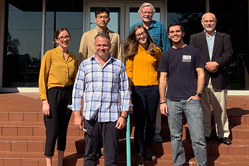 From left to right, back row, Bea Combs, Jing Chen, Professor Al Hine, Mr. Jim Aresty. Front row: Mr. Jason Mathis, Ryan Venturelli and Jonathan Sharp. Not pictured: Ellie Hudson-Heck.