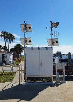Above: For comparison, water level sensors are typically part of larger arrays which require a power supply and more robust structures. The set-up pictured here is in St. Petersburg, FL and is maintained by NOAA. Photo credit: NOAA.