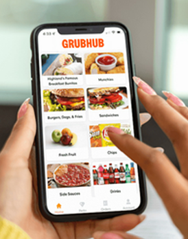Someone online ordering on their phone via GrubHub
