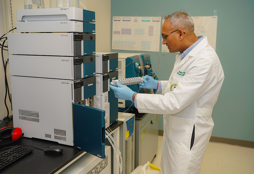 Halade placing samples into special technology to preserve them 
