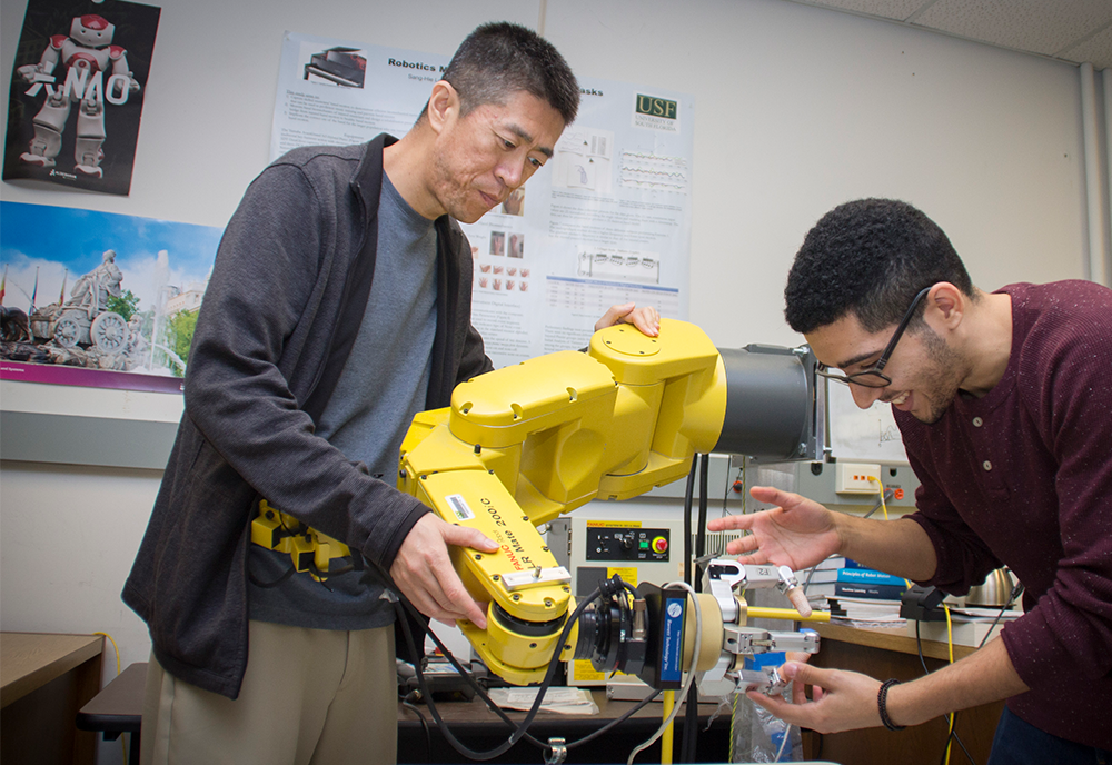 Yu Sun works on robotics