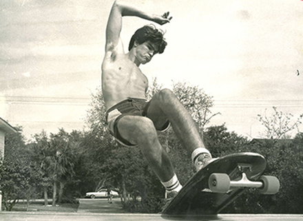 Man skateboarding on USF campus