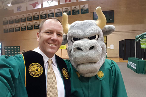 Travis Bell and Rocky the Bull