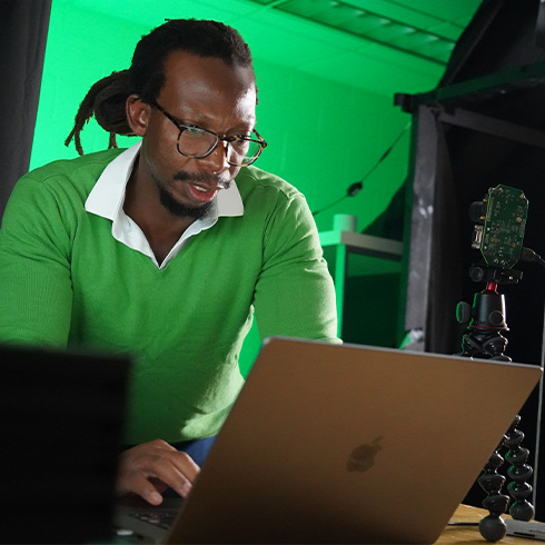 Murray-bruce looking at a computer screen