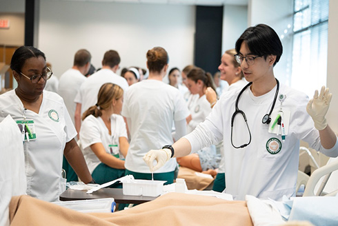 USF nursing students conduct a simulation