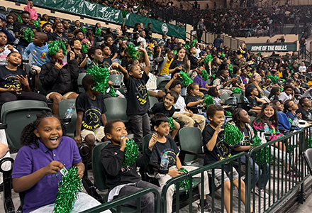 Children pack Yuengling Center during the USF women's basketball game