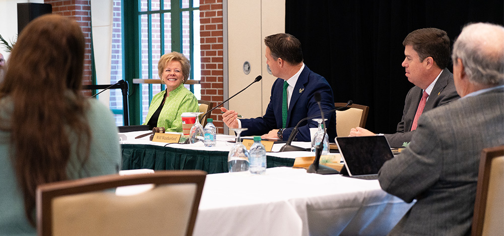 President Rhea Law speaks with trustees