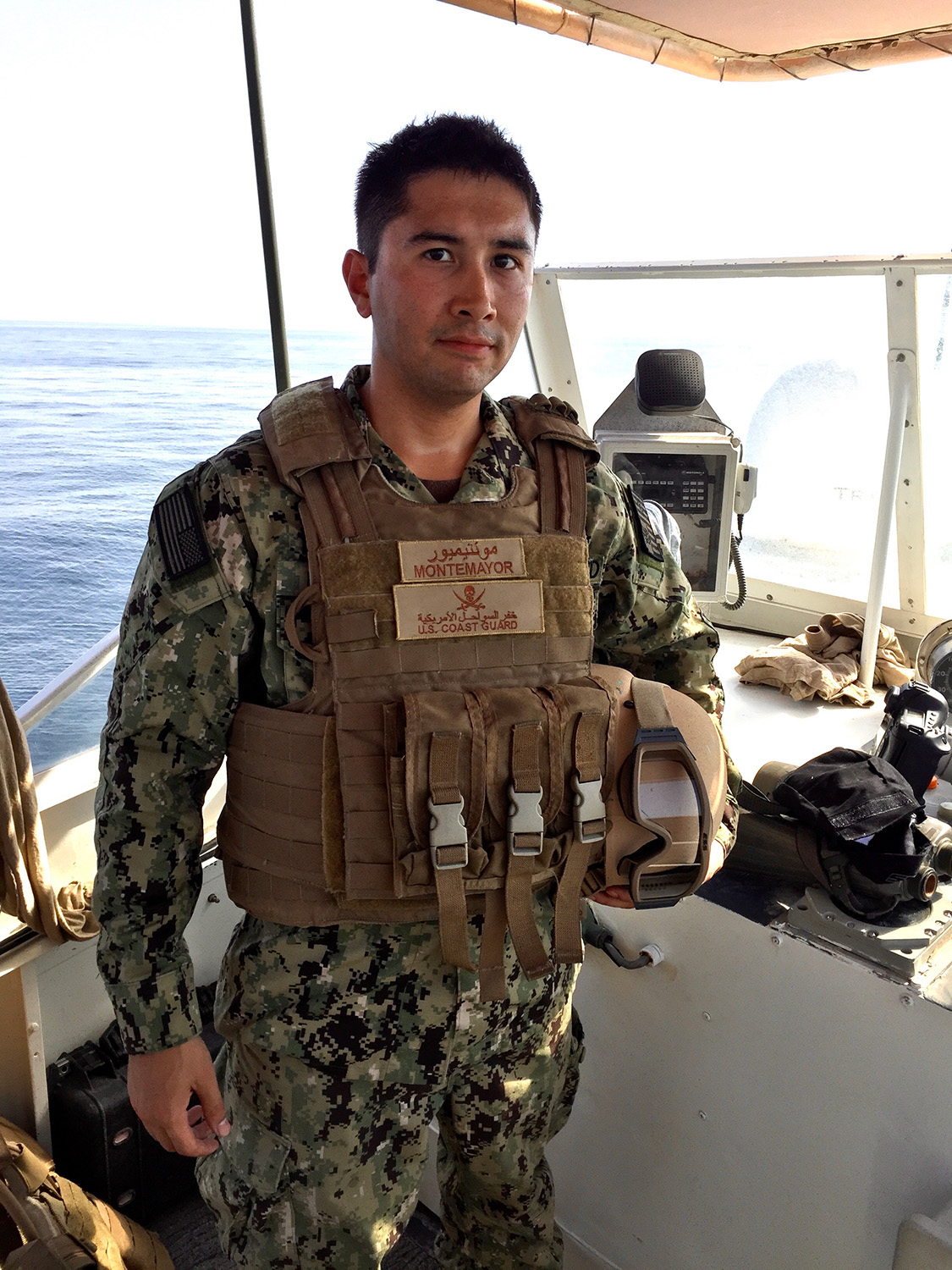 Nicholas serving in the U.S. Coast Guard