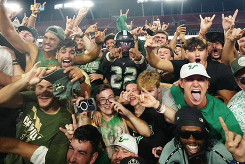 Fans surround USF football player