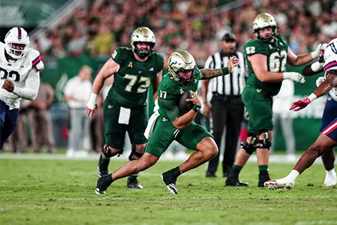 Byrum Brown runs during FAU game