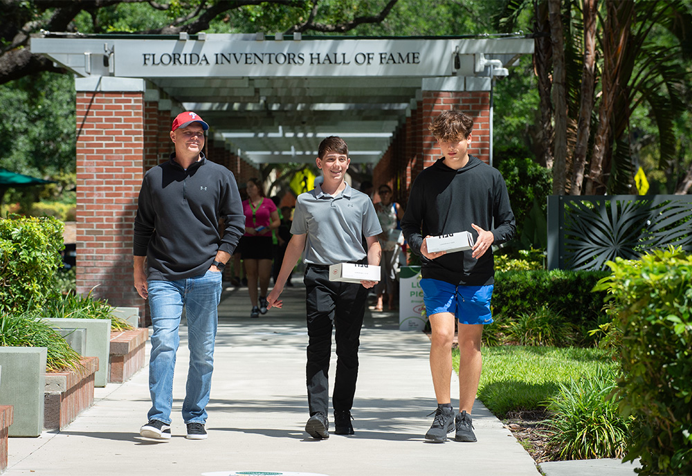 Students walking to the conference in front of the Florida inventors hall of fame