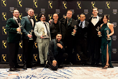 USF InEd teams poses with Emmy awards