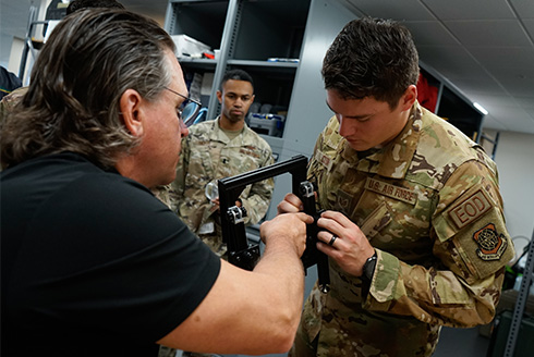 Tony Lattanze works on the JCREW with a service member