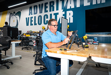 Tony Lattanze works on the JCREW device at the USF Institute of Applied Engineering
