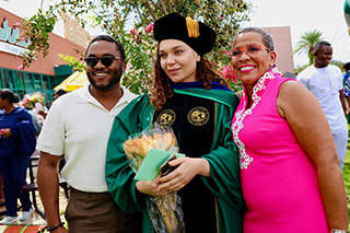 Family gathers outside USF commencement
