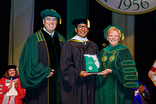 Mike Griffin, Elias Torres at President Rhea Law at USF commencement