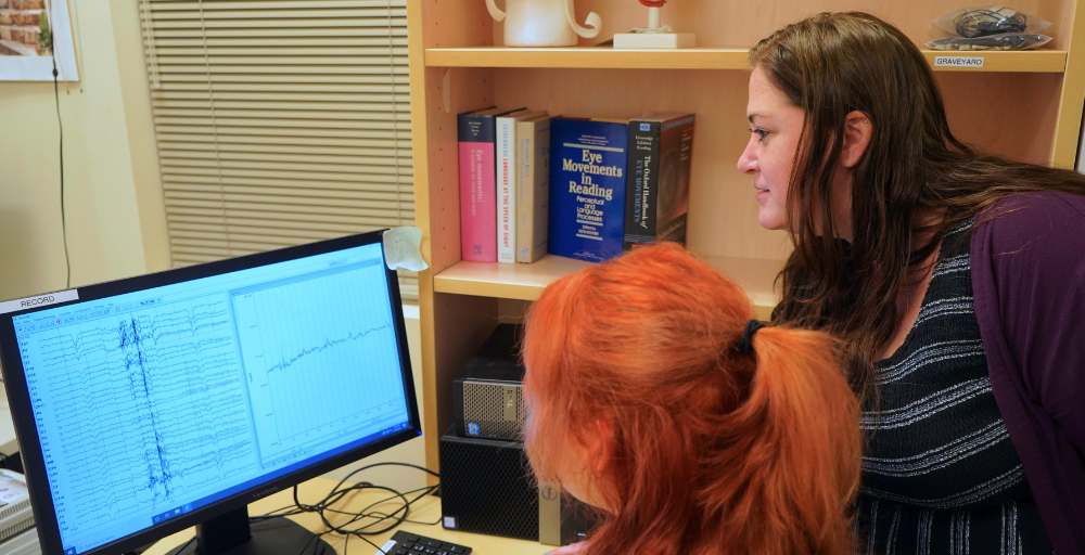 researchers monitoring brain waves