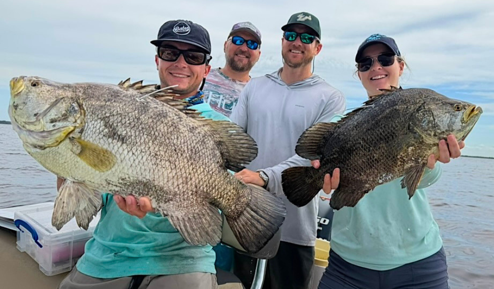 USF researchers with tripletail fish