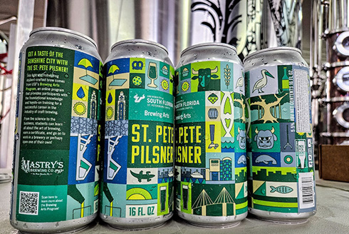 Four beer cans with labels designed that show USF St. Petersburg