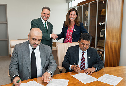 USF and Amazon leadership sign agreement