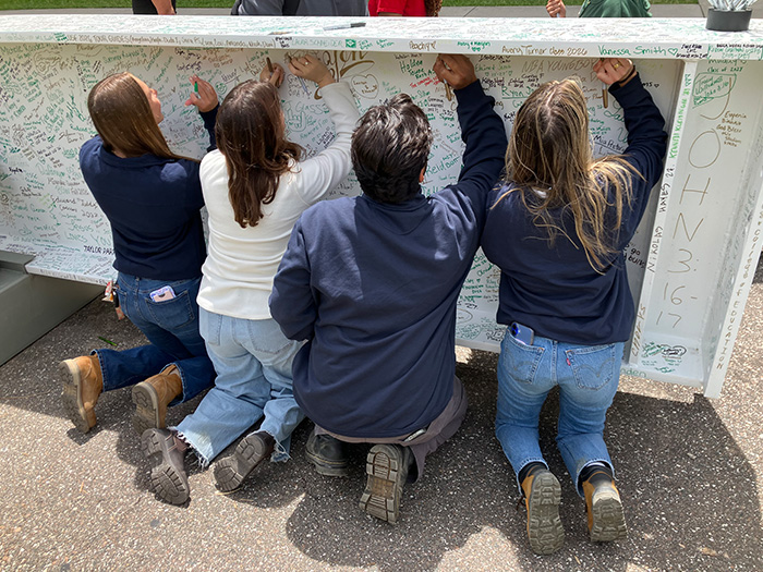 USF interns help build new on-campus stadium — etching their names into history