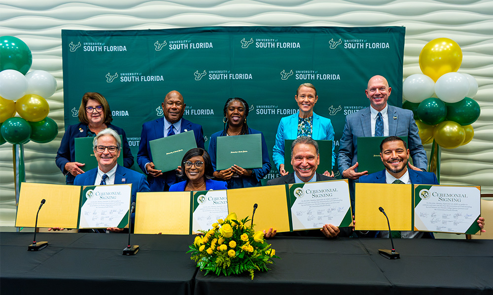 Florida college presidents at the Fuse signing with President Moez Limayem