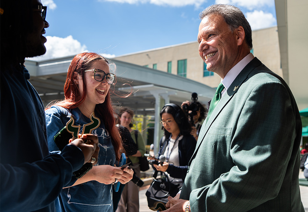 President Moez Limayem meets with students on campus