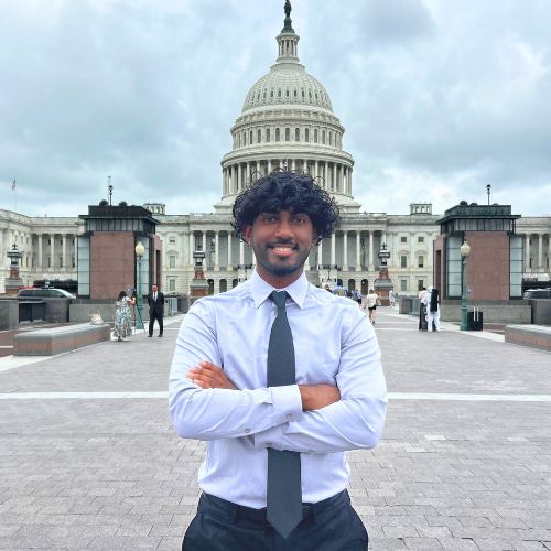 Kavi Gilman ambassador in front of U.S. Capitol
