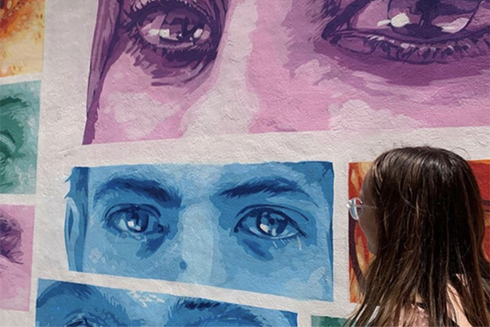 Person looking at art
