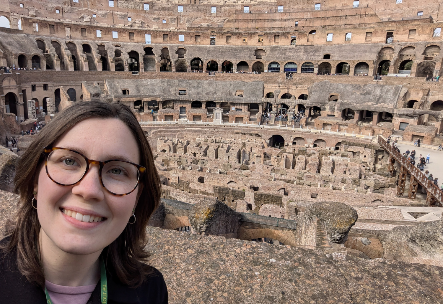 Emmy Stepp stands in front of the Colosseum in Rome