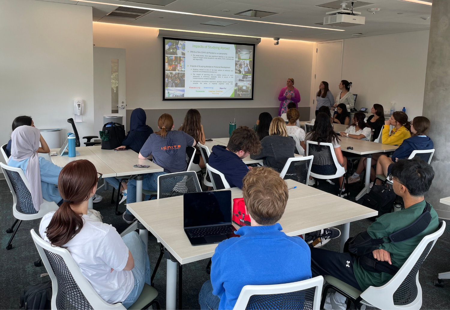 ONS workshop room full of students watching a presentation on the benefits of study abroad