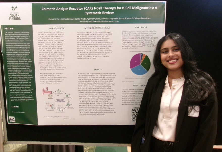 Bhavya Gudaru presents a research poster.