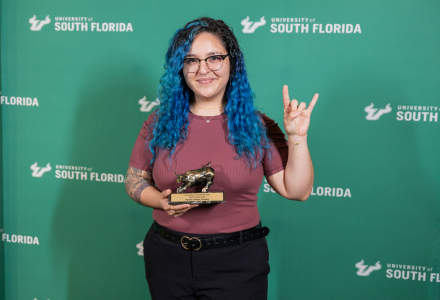 Daniela holding Golden Bull Award