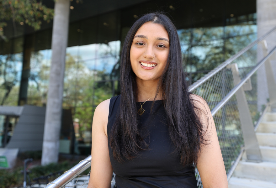 Diya Upadhyaya on steps of the Judy Genshaft Honors College