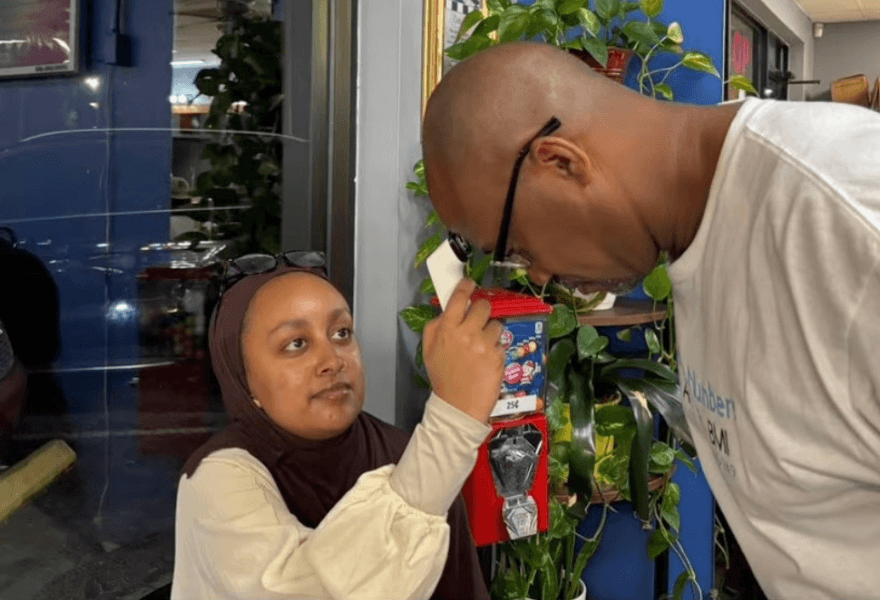 Hanan takes a man's temperature