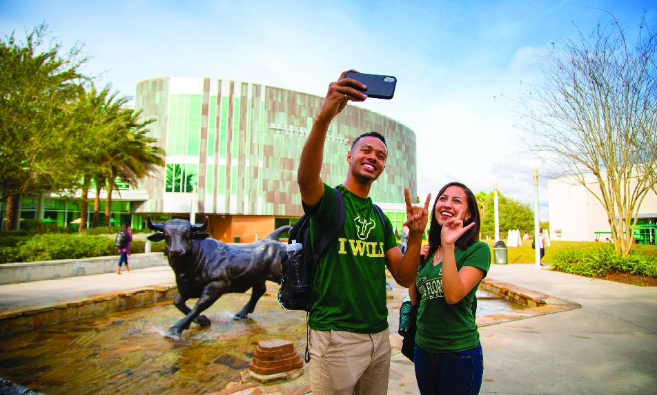 Two USF students taking a picture together