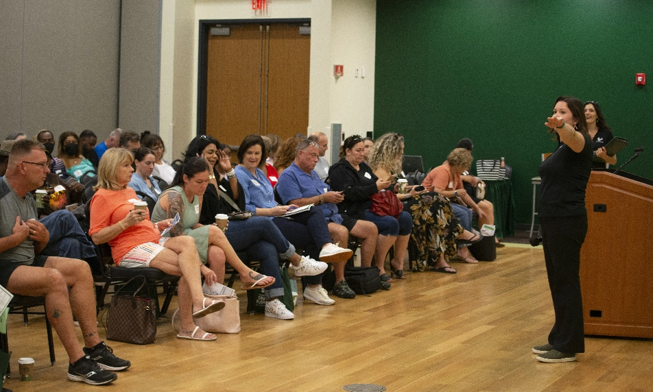 A group of guests attending orientation.