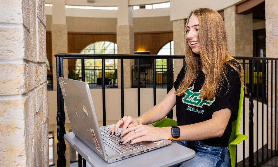 Student working on a laptop