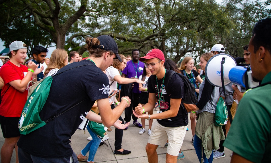 Students playing rock paper scissors