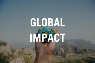 Hand holding a globe with text reading "global impact"