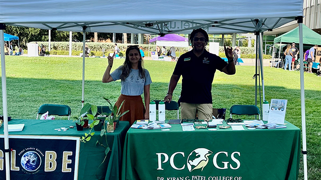 Dr. Joseph Dorsey and Globe President Angela Fama at Bulls Marketplace