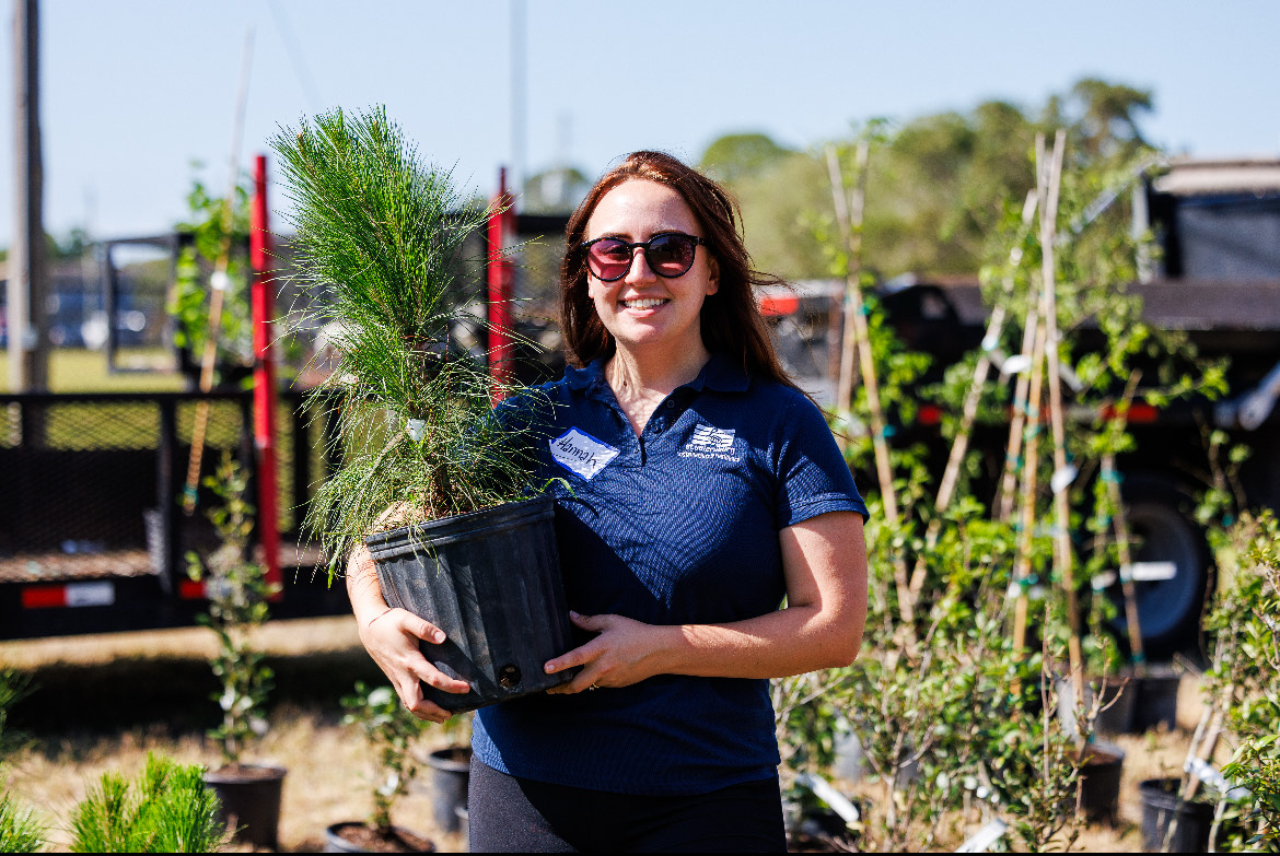 Hannah working on a native tree planting initiative