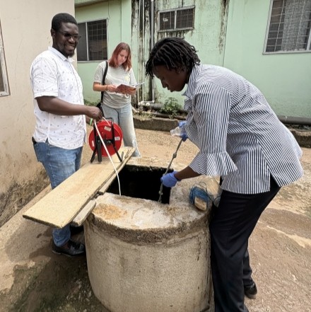 people working on a well