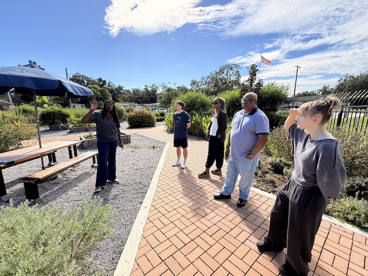 Jenise Car giving tour of TampaWell