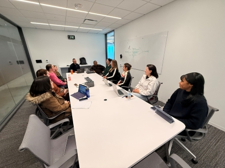 Students discussing ideas at the airport