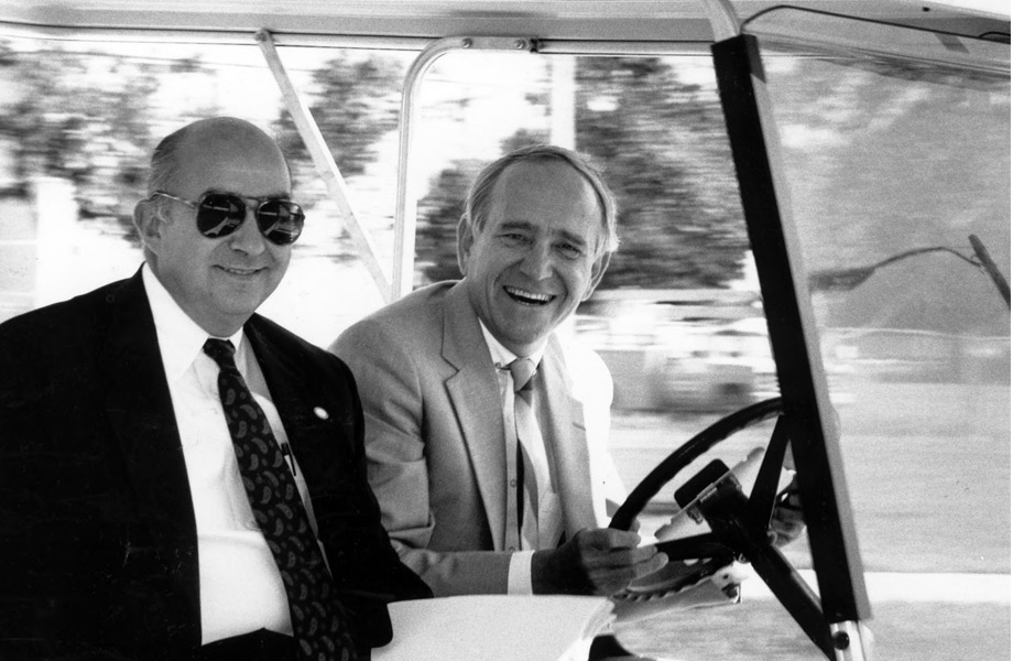 Francis Borkowski driving a golf cart