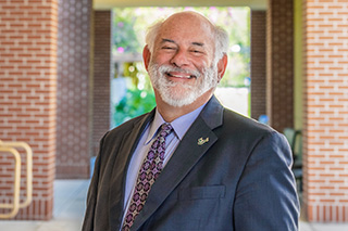 Headshot of Eric Eisenberg